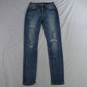 Buckle Women's Skinny Jeans - Distressed Blue